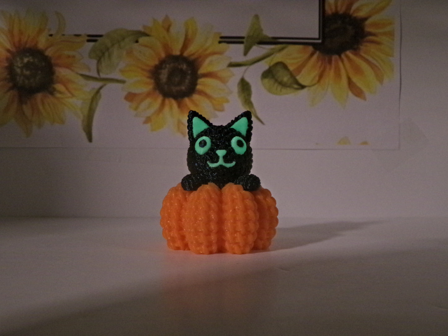 Crocheted Cat In Pumpkin cover Minder